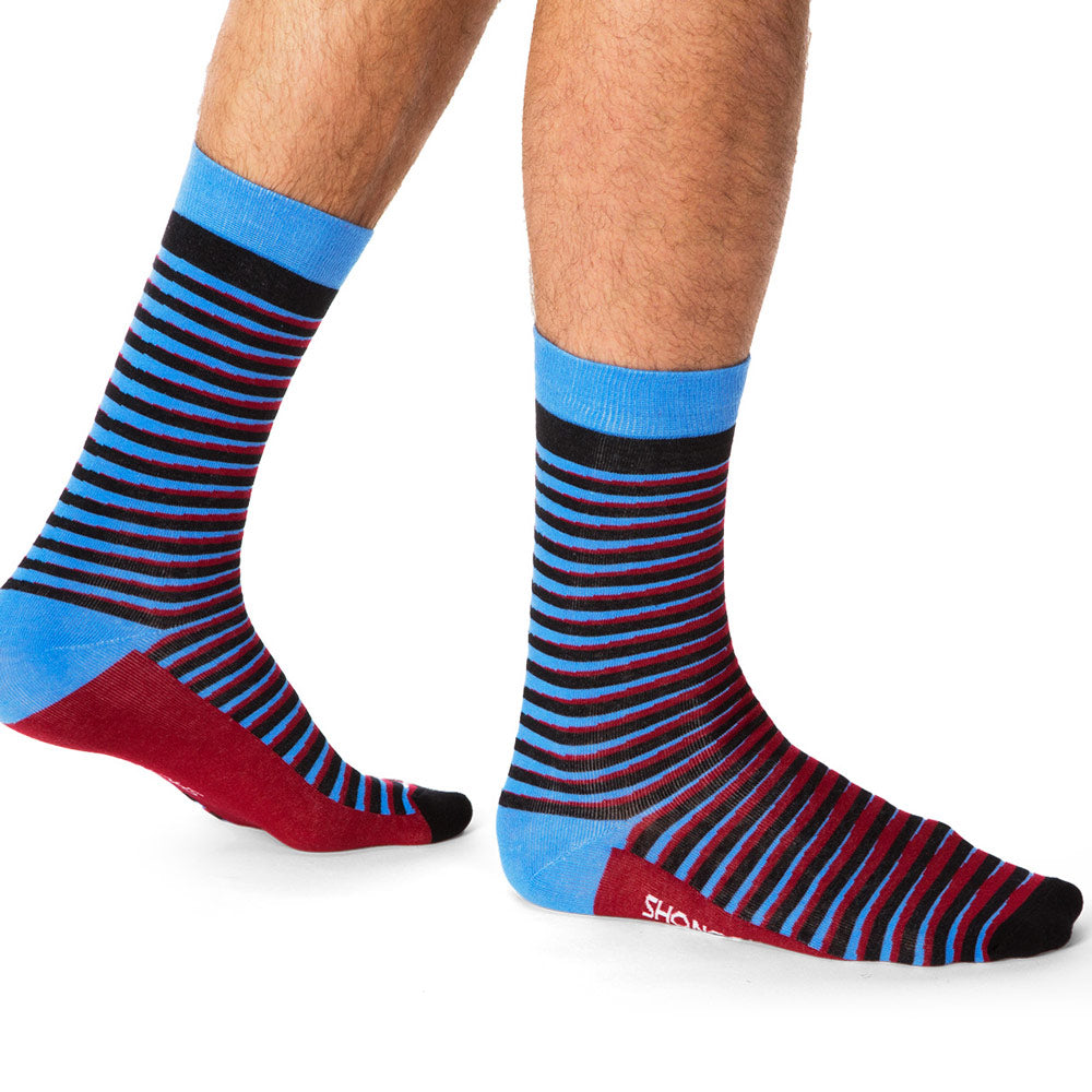 tall colorful striped socks in blue and red and black