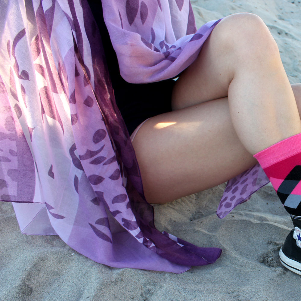 Shongolulu Leopard print scarf worn by girl on the beach