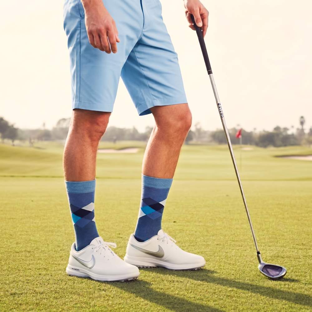 male golfer wearing the Shongolulu blue argyle socks with blue shorts on the golf course