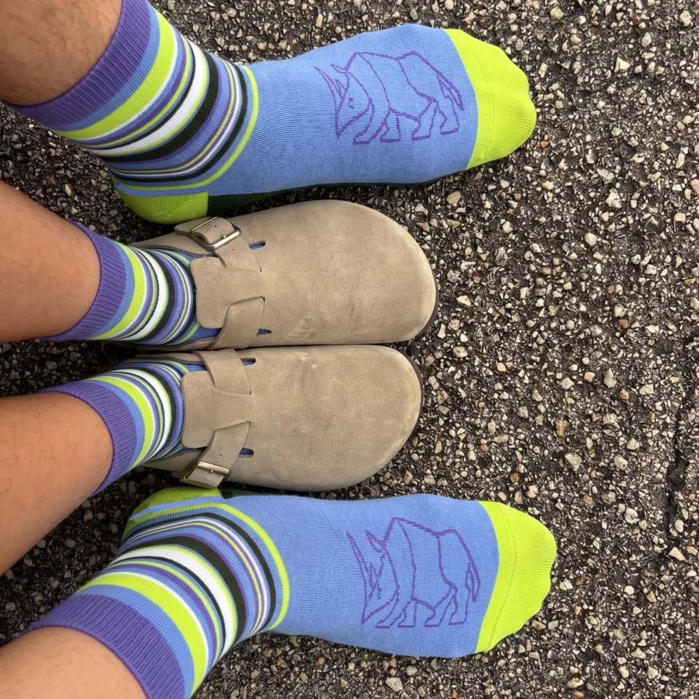 his and hers rhino print striped sock set. Crew socks shown worn with Birkenstock sandals.