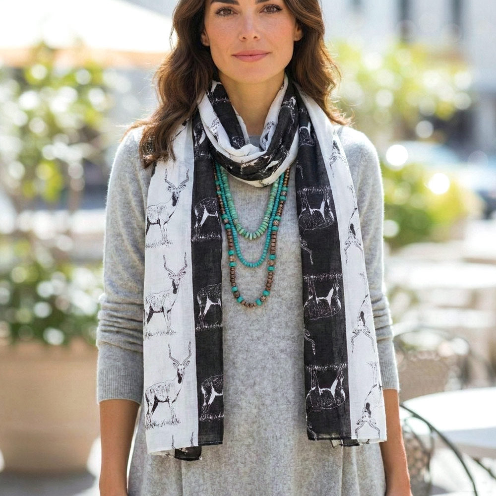 Shongolulu Antelope scarf draped around woman's neck