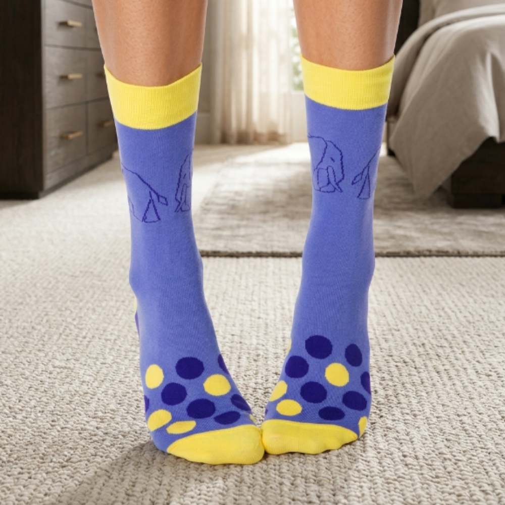 Blue socks with yellow accents with elephant print stitching