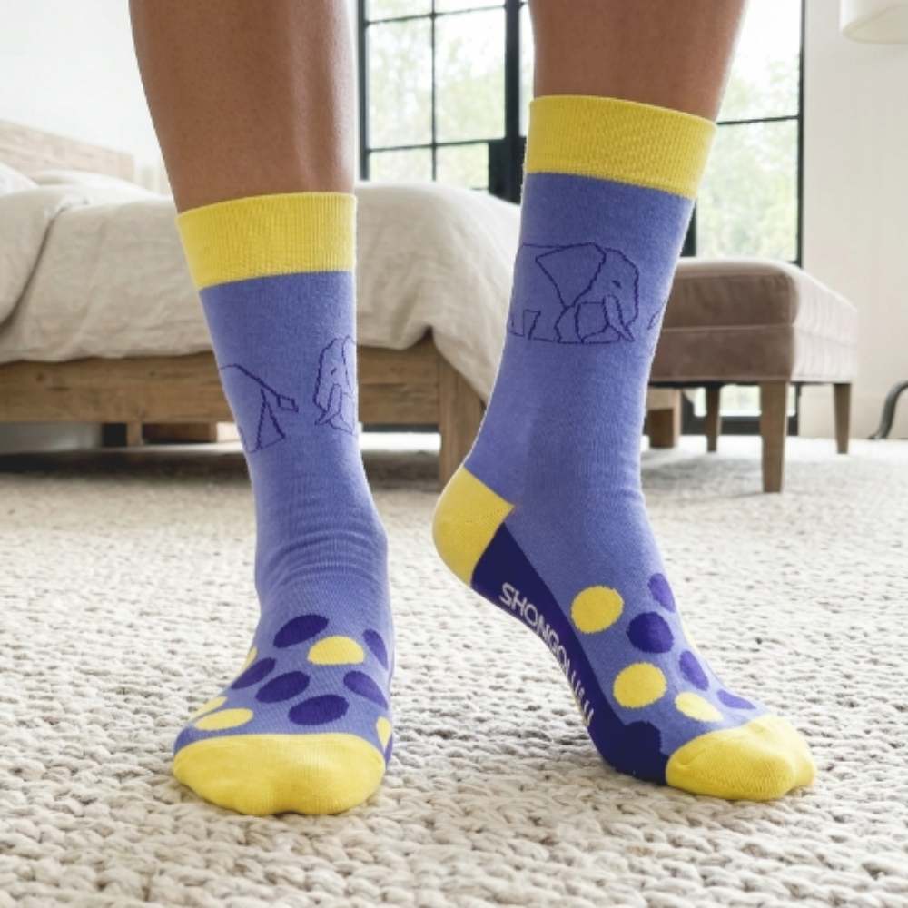 blue socks with yellow accents with elephant print stitching