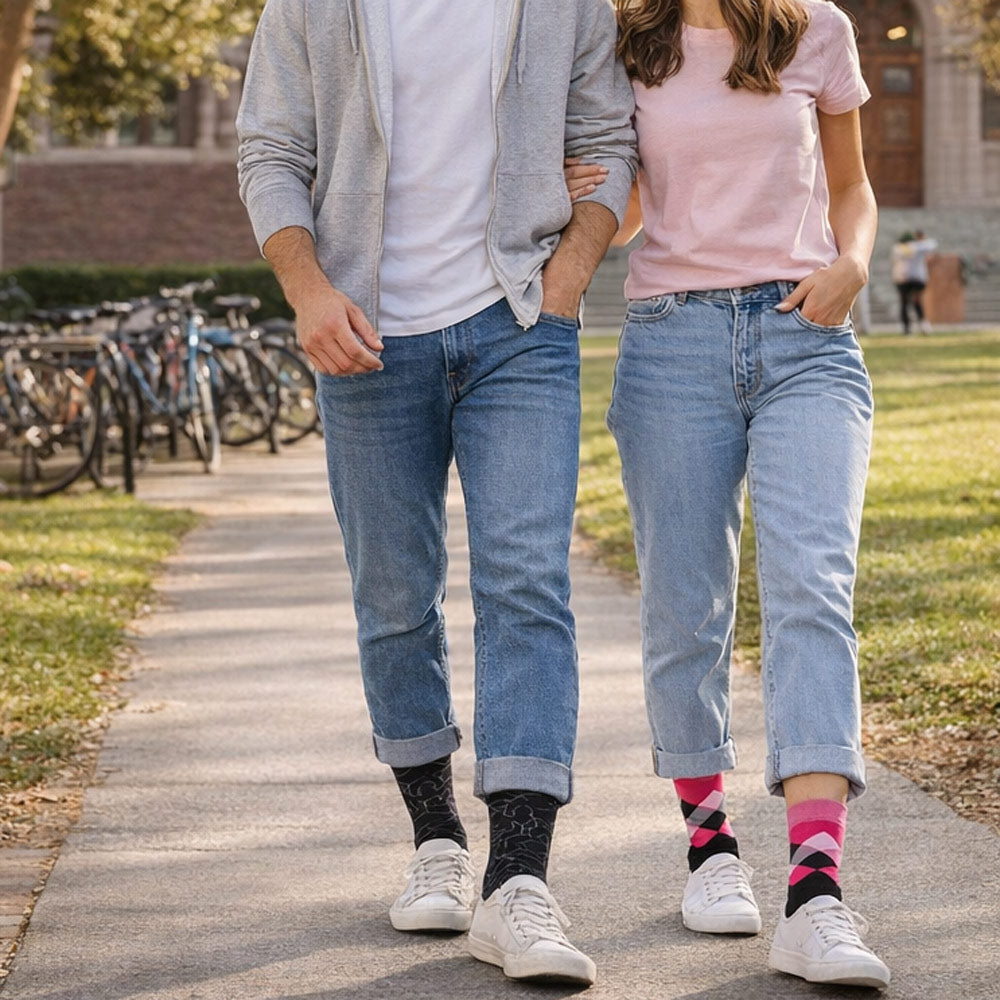 Two people walking together on a path outdoors, wearing Shongolulu socks