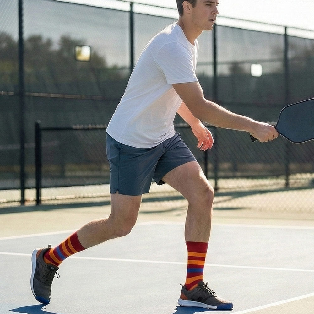 Shongolulu Lion print socks in orange red and blue stripes