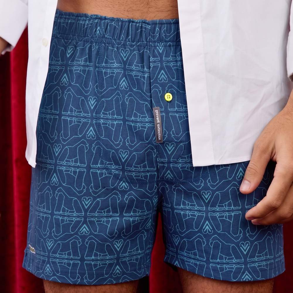 Gorilla Print Blue Boxer Shorts shown with a white button down shirt