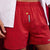 Red Leo Lion Print Boxer Shorts paired with a white button down shirt